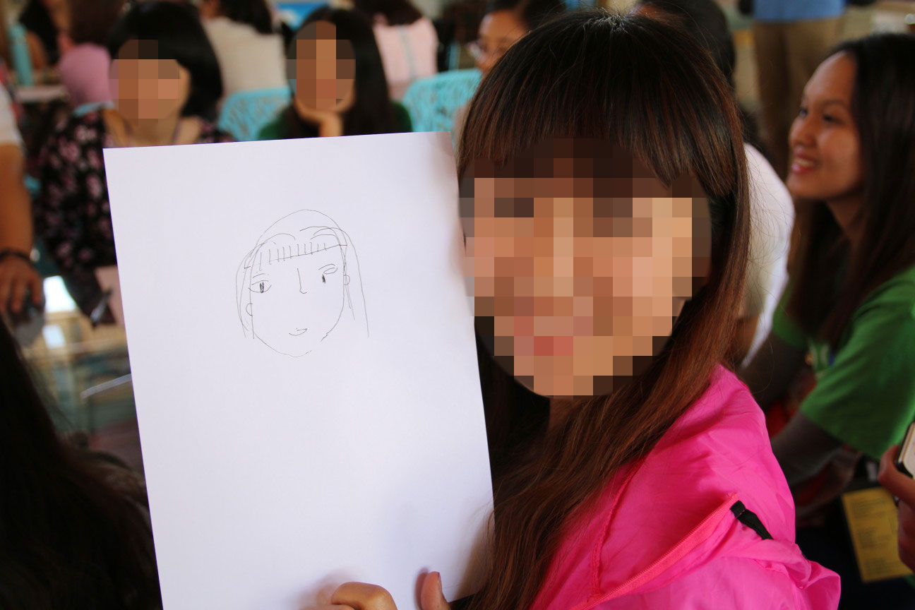 We drew our self-portraits. With our eyes closed.